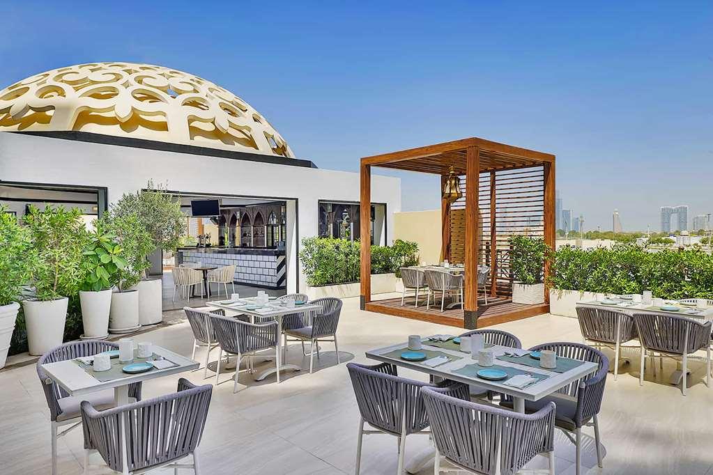 Occidental Al Jaddaf Hotel Dubái Restaurante foto